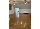 Bright room with hardwood floors, dormer windows and ceiling fans creating a comfortable living area at 6283 Harrisontown Rd, Rocky Mount, NC 27804