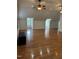 Spacious room with hardwood floors, dormer windows and ceiling fans creating a comfortable living area at 6283 Harrisontown Rd, Rocky Mount, NC 27804