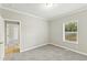 Bedroom featuring one window, recessed lighting, and an open doorway to another room at 6312 Briddle Dr, Wendell, NC 27591