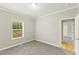Bedroom featuring one window, recessed lighting, and an open doorway to another room at 6312 Briddle Dr, Wendell, NC 27591
