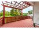 Enjoy outdoor living on this spacious wooden back deck with decorative string lights at 6819 Franklin Heights Rd, Cary, NC 27518