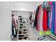 Well-organized closet featuring shelves for shoes and rods for hanging clothes, maximizing storage space at 6819 Franklin Heights Rd, Cary, NC 27518