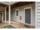 Exterior view of the residence highlighting the entry door and modern architectural details at 708 Martin Luther King Jr. Blvd # E2, Chapel Hill, NC 27514