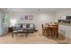 Living space featuring hardwood floors with dining area open to kitchen at 708 Martin Luther King Jr. Blvd # E2, Chapel Hill, NC 27514