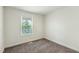 Bedroom featuring neutral walls, carpet, and a window for lots of natural light at 7120 Guess Rd, Hillsborough, NC 27278