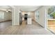 Open concept kitchen with new appliances, island, and access to the deck at 7120 Guess Rd, Hillsborough, NC 27278