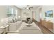 Cozy living room featuring comfortable seating, wood floors, and a serene ambiance at 7120 Guess Rd, Hillsborough, NC 27278