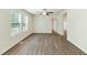 Bright living room featuring modern vinyl floors, and double windows with lots of light at 7120 Guess Rd, Hillsborough, NC 27278