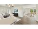 Bright living room featuring modern furniture, wood floors, and an open layout perfect for entertaining at 7120 Guess Rd, Hillsborough, NC 27278