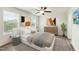 Serene main bedroom featuring a comfortable bed, modern decor, and ample natural light for relaxation at 7120 Guess Rd, Hillsborough, NC 27278