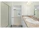 Bathroom features double sinks on a countertop and a separate shower to the left at 7122 Guess Rd, Hillsborough, NC 27278