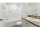 Bathroom showcasing single sink vanity, tub/shower combo, and chrome fixtures at 7122 Guess Rd, Hillsborough, NC 27278