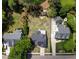 An aerial perspective captures the expansive yard and surrounding homes at 721 Shelley Rd, Raleigh, NC 27609