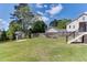 Large backyard showing the fence, shed, and fire pit at 721 Shelley Rd, Raleigh, NC 27609
