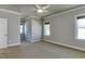 Bedroom featuring natural light, carpet, and a ceiling fan. Perfect for rest and relaxation at 721 Shelley Rd, Raleigh, NC 27609