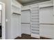 Spacious walk-in closet with custom shelves and hanging rods for optimal storage at 721 Shelley Rd, Raleigh, NC 27609