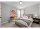Neutral bedroom with a desk, warm decor, and comfortable carpet offers a cozy and inviting space at 802 Knollwood Dr, Apex, NC 27502