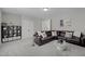 Inviting living room with plush seating, stylish decor, and bright lighting for relaxation and comfort at 802 Knollwood Dr, Apex, NC 27502