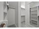 Spacious and well-organized walk-in closet with ample storage space, perfect for any wardrobe at 802 Knollwood Dr, Apex, NC 27502