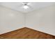 Bright and airy bedroom with hardwood floors, a ceiling fan, and neutral walls at 803 Driftwood Dr, Gibsonville, NC 27249