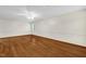 Spacious bedroom with hardwood floors, ceiling fan, neutral walls and plenty of natural light at 803 Driftwood Dr, Gibsonville, NC 27249