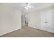 Bedroom with carpet, neutral color, ceiling fan, access to hall and closet, ready for customization at 803 Driftwood Dr, Gibsonville, NC 27249