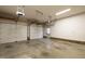 Clean, spacious garage with multiple doors and high ceilings, offering ample parking and storage at 803 Driftwood Dr, Gibsonville, NC 27249