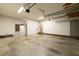 Large garage with side entrance, high ceilings and storage, offering functionality and convenience at 803 Driftwood Dr, Gibsonville, NC 27249