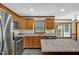 Eat-in kitchen featuring stainless steel appliances and granite countertops at 803 Driftwood Dr, Gibsonville, NC 27249