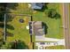 Aerial view of a home with a fenced backyard, trampoline, and solar panels at 810 Mulberry Rd, Spring Hope, NC 27882