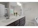 Bathroom with double sinks, modern fixtures, and vanity with ample storage at 810 Mulberry Rd, Spring Hope, NC 27882