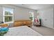 Bedroom with neutral walls, carpet, and natural light from a windows at 810 Mulberry Rd, Spring Hope, NC 27882