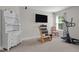 Bedroom featuring neutral walls, carpet, and a entertainment system at 810 Mulberry Rd, Spring Hope, NC 27882