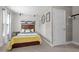 Bedroom featuring a neutral wall, carpet, and a queen bed at 810 Mulberry Rd, Spring Hope, NC 27882