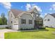 Charming two-story home with attached garage, manicured lawn, and inviting covered porch at 810 Mulberry Rd, Spring Hope, NC 27882