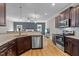 Well-appointed kitchen with granite countertops, stainless appliances, and ample cabinetry at 810 Mulberry Rd, Spring Hope, NC 27882