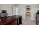 Home office area with a desk and a walk in closet at 810 Mulberry Rd, Spring Hope, NC 27882