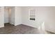 Cozy bedroom with wood flooring, neutral walls, and a window offering plenty of natural light at 813 Canis Minor Rd, Wendell, NC 27591