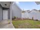Landscaped backyard, with white vinyl fencing and walkway, perfect for outdoor enjoyment at 900 Ambergate Sta, Apex, NC 27502