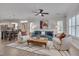 Spacious living room open to the dining area offers a comfortable living space with contemporary decor and ample light at 900 Ambergate Sta, Apex, NC 27502