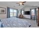 Spacious main bedroom boasts large windows, a vaulted ceiling, and plush carpeting at 900 Ambergate Sta, Apex, NC 27502