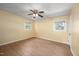 A light and airy bedroom features new flooring, a ceiling fan, and natural light at 926 Allister Rd, Durham, NC 27703