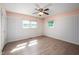 Bedroom has modern flooring, a ceiling fan, and natural light at 926 Allister Rd, Durham, NC 27703