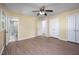 Bedroom with neutral paint, new flooring, a ceiling fan, and ensuite bathroom at 926 Allister Rd, Durham, NC 27703