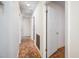 Hallway with hardwood floors leading to bedrooms and living areas at 926 Allister Rd, Durham, NC 27703
