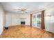 Bright living room with fireplace and glass patio doors for seamless outdoor access at 926 Allister Rd, Durham, NC 27703