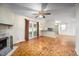 Inviting living room with fireplace, patio access, and kitchen bar seating at 926 Allister Rd, Durham, NC 27703