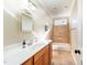 Bathroom featuring custom vanity and tiled shower-tub combination at 944 Alden Bridge Dr, Cary, NC 27519