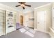 Bright bedroom with open shelving and lots of natural light at 944 Alden Bridge Dr, Cary, NC 27519