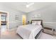 Bedroom features neutral walls, carpet, ensuite and door leading to another room with an open layout at 944 Alden Bridge Dr, Cary, NC 27519